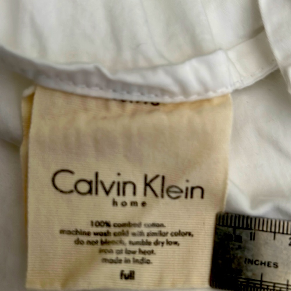 Calvin Klein Home.  full size White sheets